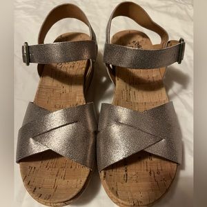 Kork Ease metallic gold platform sandals.